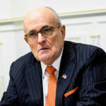 Rudy Giuliani in a suit.