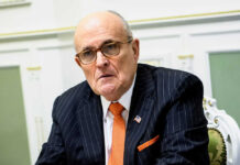 Rudy Giuliani in a suit.