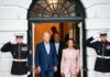 Joe Biden and Kamala Harris exit building with guards.