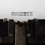 Typewriter with paper saying GOODBYE