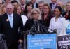 Liz Cheney and group at prolife rally with signs and microphones