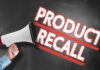 Megaphone and Product Recall text on chalkboard.