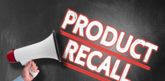 Megaphone and Product Recall text on chalkboard.