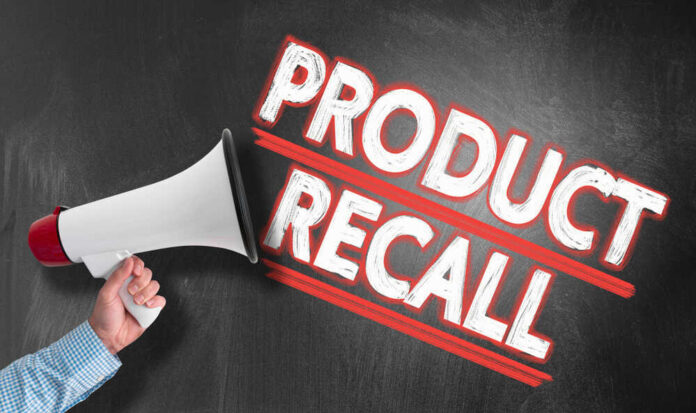 Megaphone and Product Recall text on chalkboard.