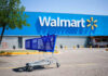 Shopping cart in a Walmart parking lot.