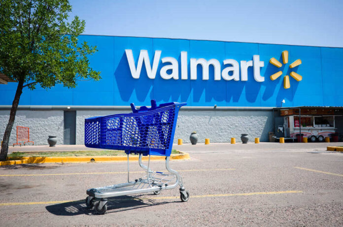 Shopping cart in a Walmart parking lot.