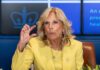 Jill Biden yellow speaking and gesturing with hand