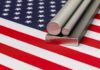 Steel stock on flag of United States of America. Steel manufacturing, production and trade concept.