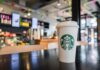 Coffee cup on table in cafe interior