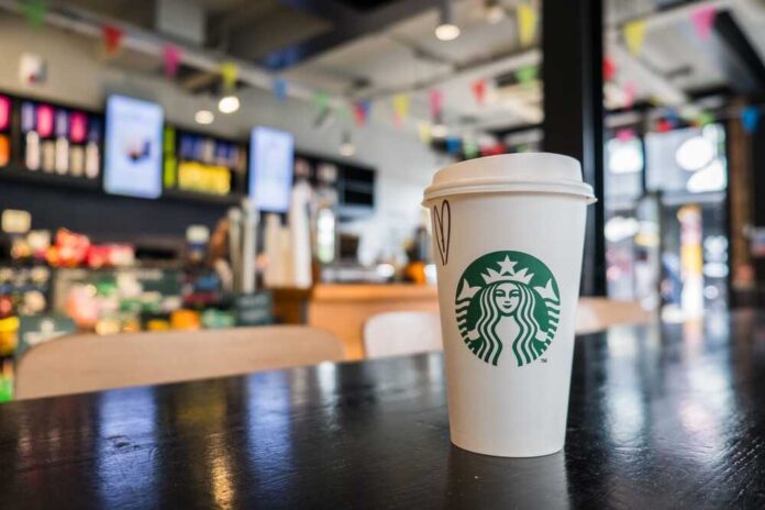 Coffee cup on table in cafe interior