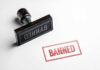 Banned rubber stamp and stamped text on paper