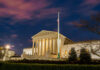 The United States Supreme Court building at dusk.