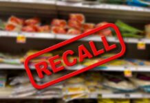 Recall notice over grocery store shelves.