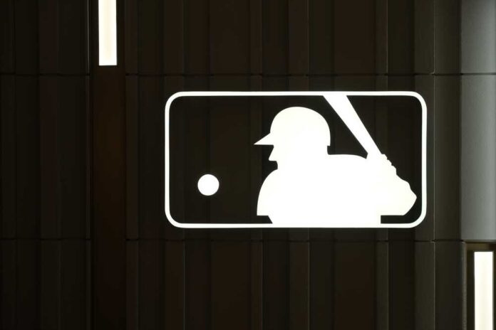 MLB logo with a baseball player silhouette