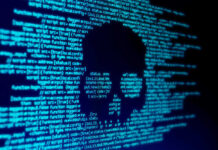 Skull silhouette in blue computer code background.