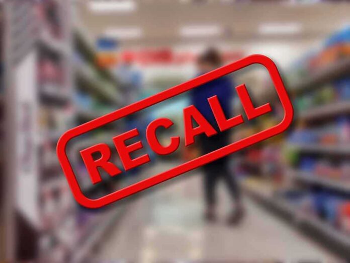 2187841613 featured image Recall stamp on blurred store aisle background.