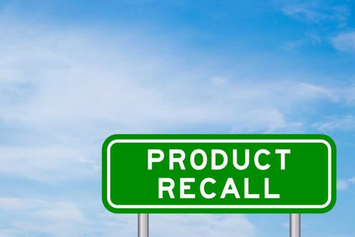 shutterstock_2182367505.jpg featured image Green sign with product recall text and sky background