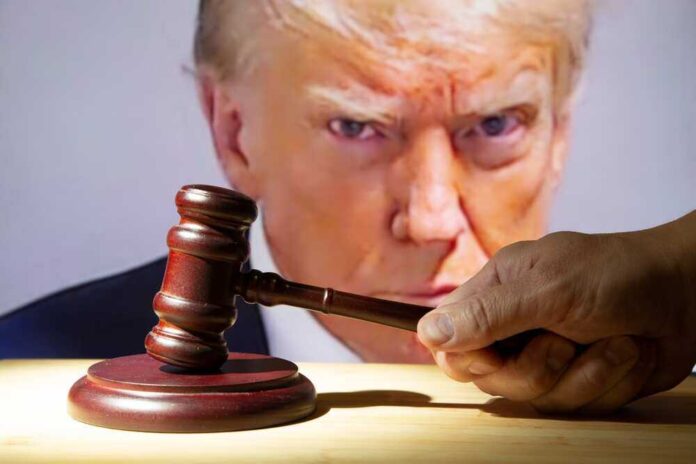 shutterstock_2362003039.jpg featured image Gavel in front of Donald Trump's face on screen.