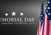 Memorial Day banner with American flags.