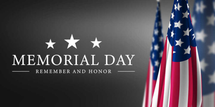 shutterstock_1963438435.jpg featured image Memorial Day banner with American flags.