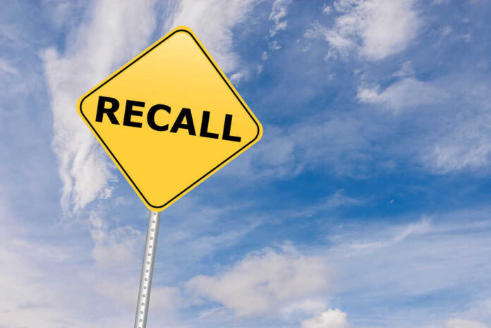 shutterstock_529192612.jpg featured image Yellow sign with RECALL text against blue sky.