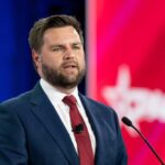 JD Vance man at speaking event.