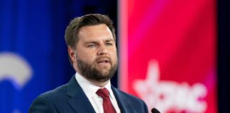 JD Vance man at speaking event.