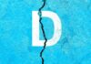 Cracked blue surface with letter D.