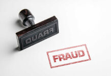 Fraud stamp and red stamped imprint on paper