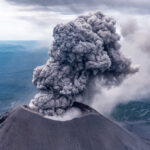 VOLCANIC CHAOS: Ash Cloud Soars 11 Miles! (Video) Volcano erupting with large ash plume in sky