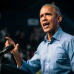 Obama SLAMS Trump – ‘Colossal Mistake!’ Barack Obama speaks at podium.