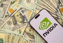 Hundred dollar bills and smartphone showing Nvidia logo