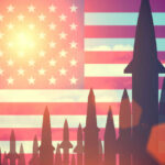 Missiles silhouetted against American flag background with sunset