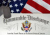 Military dog tags on honorable discharge certificate