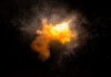 Bright explosion against a dark background with sparks