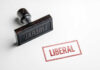 Rubber stamp with the word LIBERAL
