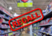 Blurred store aisle with RECALL stamp overlay