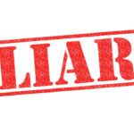 Red stamp with the word liar