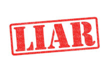 Red stamp with the word liar