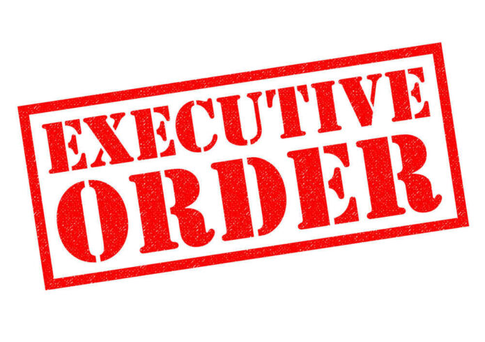 shutterstock_574615495.jpg Red stamp reading executive order