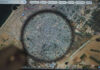 Magnifying glass highlighting Gaza on Google Maps