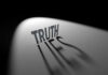 Truth casting shadow spelling Lies on curved surface