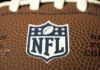 Close-up of NFL logo on American football