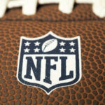 Close-up of NFL logo on American football