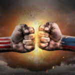 U.S. and Russian flag fists colliding dramatically.