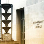 Exterior view of the Department of Justice building with architectural features