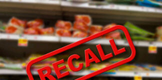 Recall notice over grocery store shelves.