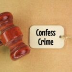 Child Torture Horror: Woman Confesses A wooden gavel next to a tag that reads 'Confess Crime'