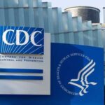 Signage of the CDC building displaying its name and logo