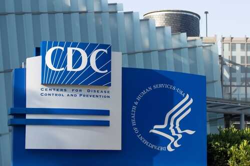 Signage of the CDC building displaying its name and logo